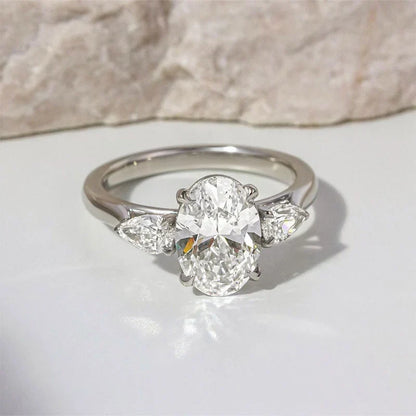 Oval Cut Three Stone Engagement Ring