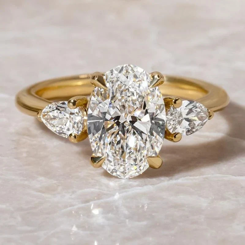 Oval Cut Three Stone Engagement Ring